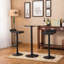 Table de bar ronde avec pieds et base en métal, jumelée à des tabourets de bar réglables en cuir reconstitué pour un ensemble de bar complet