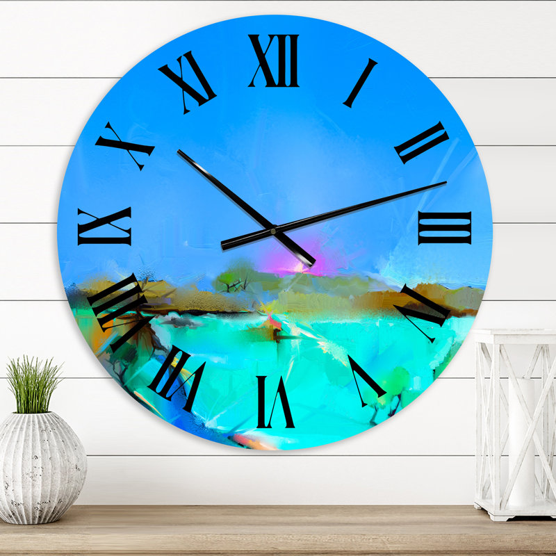 Coucher de soleil coloré dans différentes nuances de bleu - Horloge murale traditionnelle, Moyen