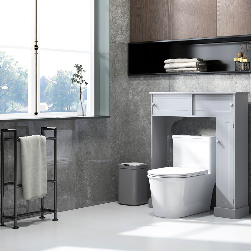 Rangement au-dessus de la toilette en gris, avec tablettes réglables et agencement de salle de bain organisé