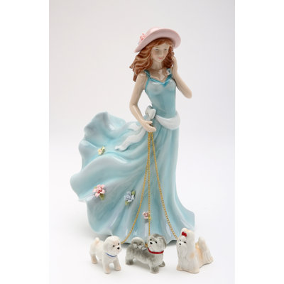 Lady Walking With Dogs Figurine