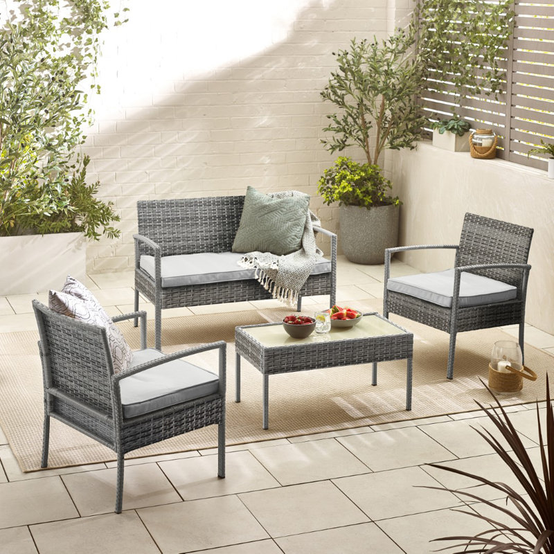 Ensemble de chaises et de table basse en rotin PE pour 4 personnes Kellsey - Jardin et patios