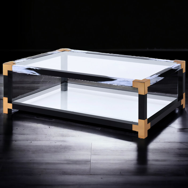 Table basse élégante avec plateau en verre et base en métal blanc brossé