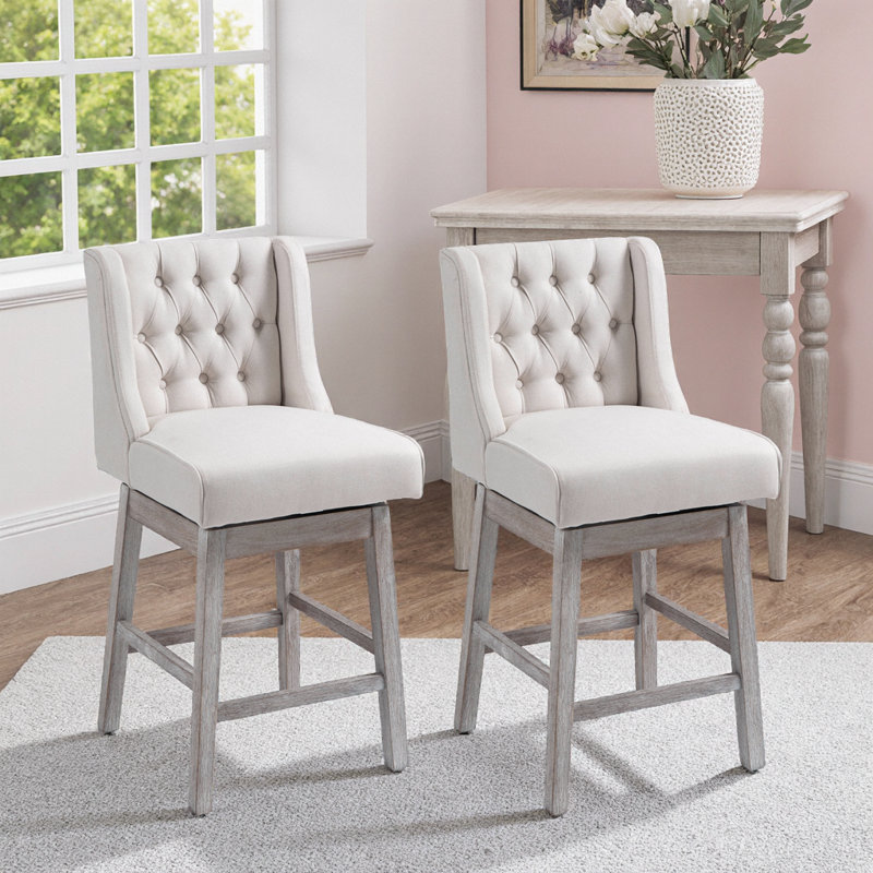 Ensemble de 2 tabourets de bar pivotants beiges avec rotation à 180 degrés, conception capitonnée et repose-pieds en bois massif