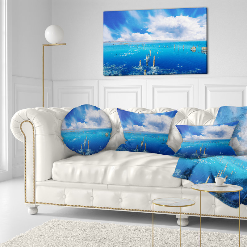 Magnifique coussin bleu à motif de mer et de rivage