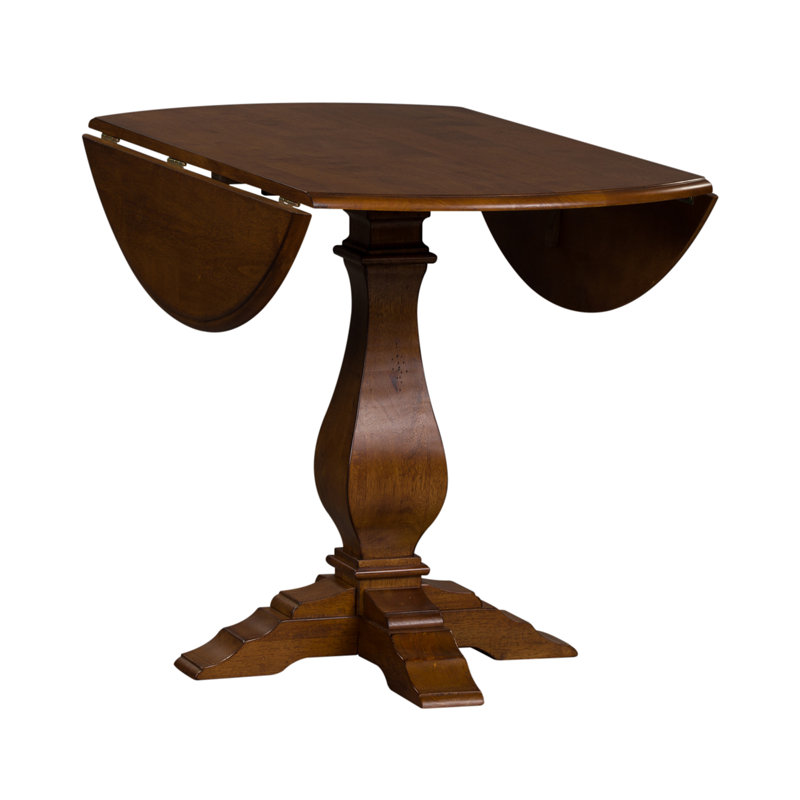 Knaack Extendable Round Solid Wood Dining Table