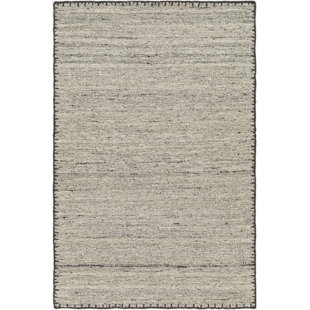 https://assets.wfcdn.com/im/58763048/resize-h310-w310%5Ecompr-r85/2457/245751780/jayde-handmade-wool-grayblack-rug.jpg