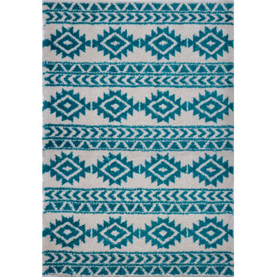 Tapis géométrique ivoire / turquoise Shirehampton