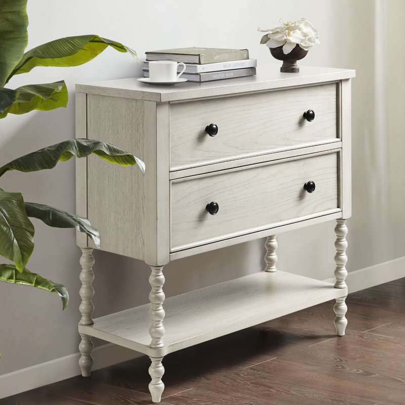 Commode d'appoint raffinée à 2 compartiments, fini blanc antique et structure en bois massif, pour une décoration intérieure élégante.