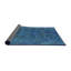 Tapis oriental bleu-692453260