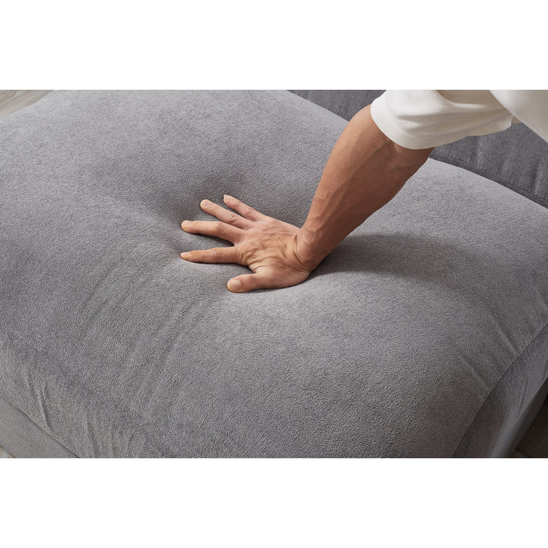 Canapé modulaire à assise profonde avec repose-pieds, revêtement en velours côtelé pour plus de confort et de polyvalence dans les salons et les bureaux