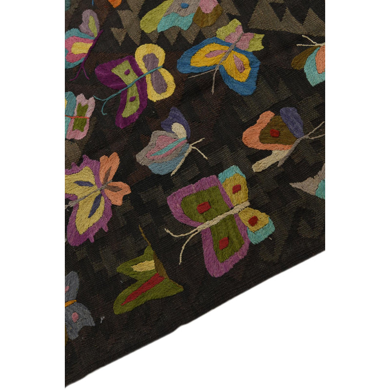 Tapis brun foncé Pelfrey