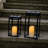 Lantern Modern 15.8''H Battery Powered Integrated LED Outdoor Lantern w/ LED Timer Candles