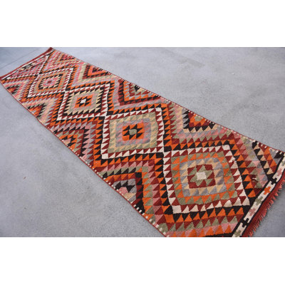 Tapis rouge élégant en laine Kilim