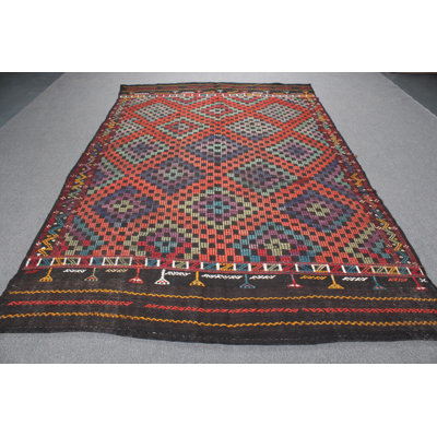 Vintage Turkish Oushak Kilim Rug with Geometric Patterns and Bold Black Accents for Bedroom Decor