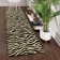Testerman Animal Print Indoor Rug