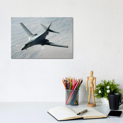 A US Air Force B-1B Lancer On A Combat Patrol Over Afghanistan by Stocktrek Images - Wrapped Canvas Print