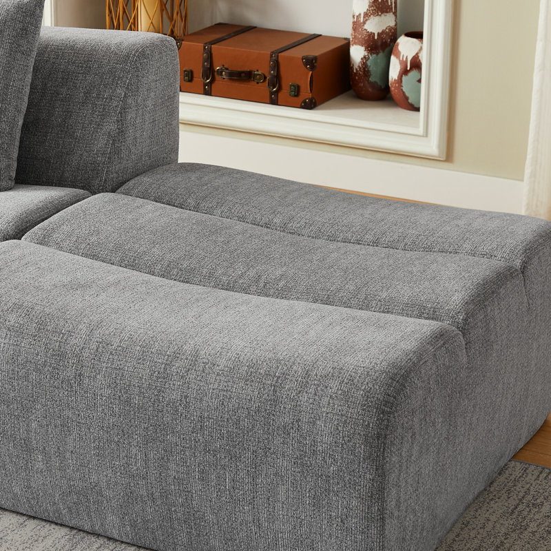 Canapé 3 places compressé en chenille grise, livré monté, idéal pour appartement, confortable et peu encombrant, avec soutien en mousse et ressorts ensachés. Doux au toucher, design élégant, prêt à l'emploi.