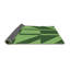Tapis vert à motif abstrait-998310603