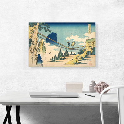 «The Suspension Bridge on the Border of Hida and Etchu Provinces 1830» par Katsushika Hokusai, reproduction d'art sur toile tendue