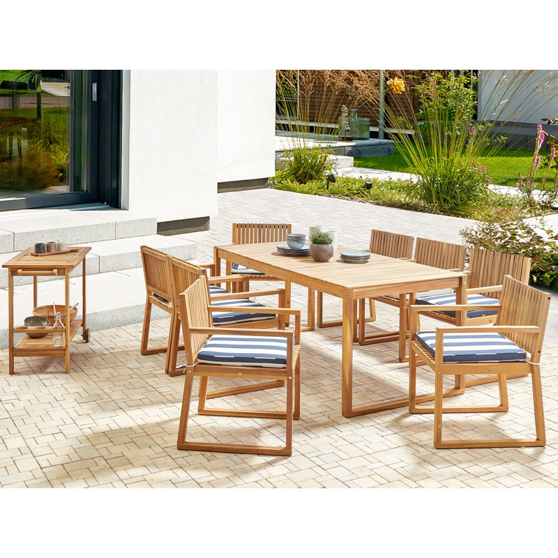Adamina 8 - Person Acacia Solid Wood Patio Dining Set Rectangular Table with Cushions Included, Navy Blue