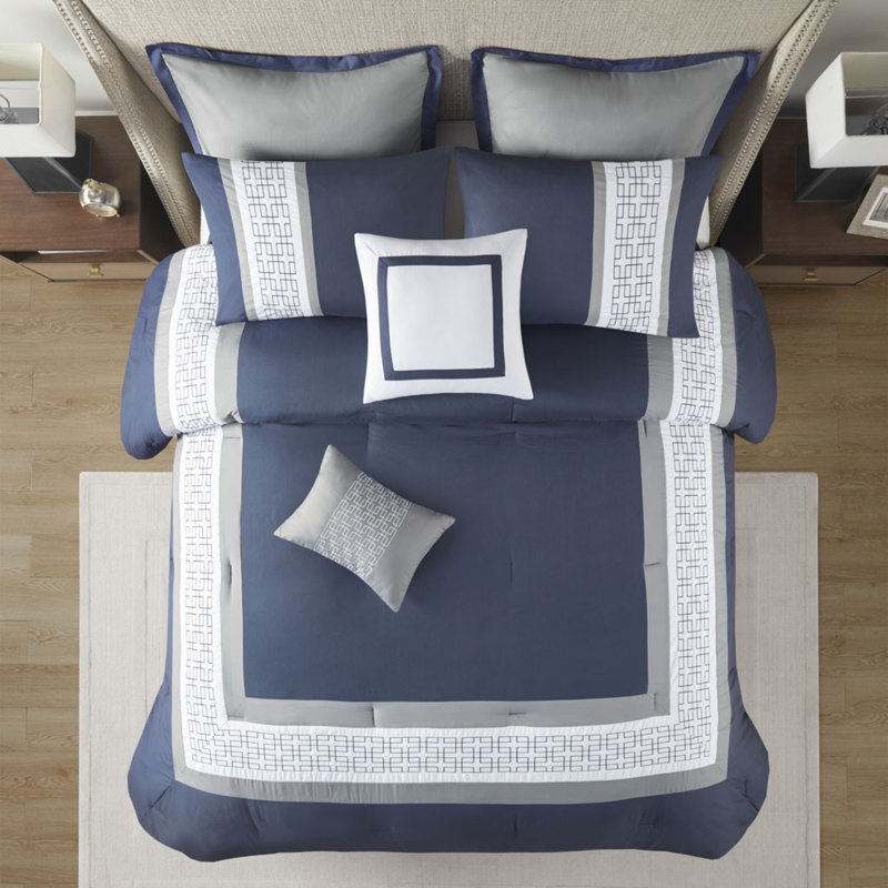 Ensemble d'édredon élégant bleu marine avec détails brodés