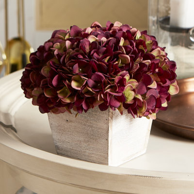 Arrangement d'hortensias bourgogne en tissu synthétique en pot