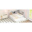 Lit de jour double en métal blanc avec couchette, rangement et motif caractéristique