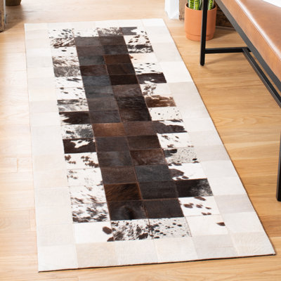 Herdon Hand Woven Leather/Felted Cloth Abstract Rug in Ivory/Brown