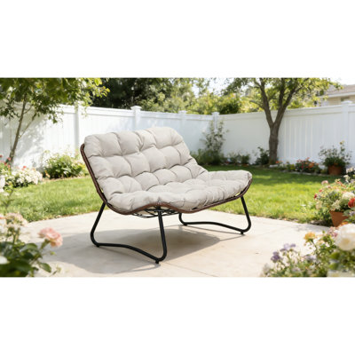 Banc à bascule d'extérieur résistant aux intempéries avec coussin luxueux pour jardin, balcon ou terrasse. Structure en acier marron.