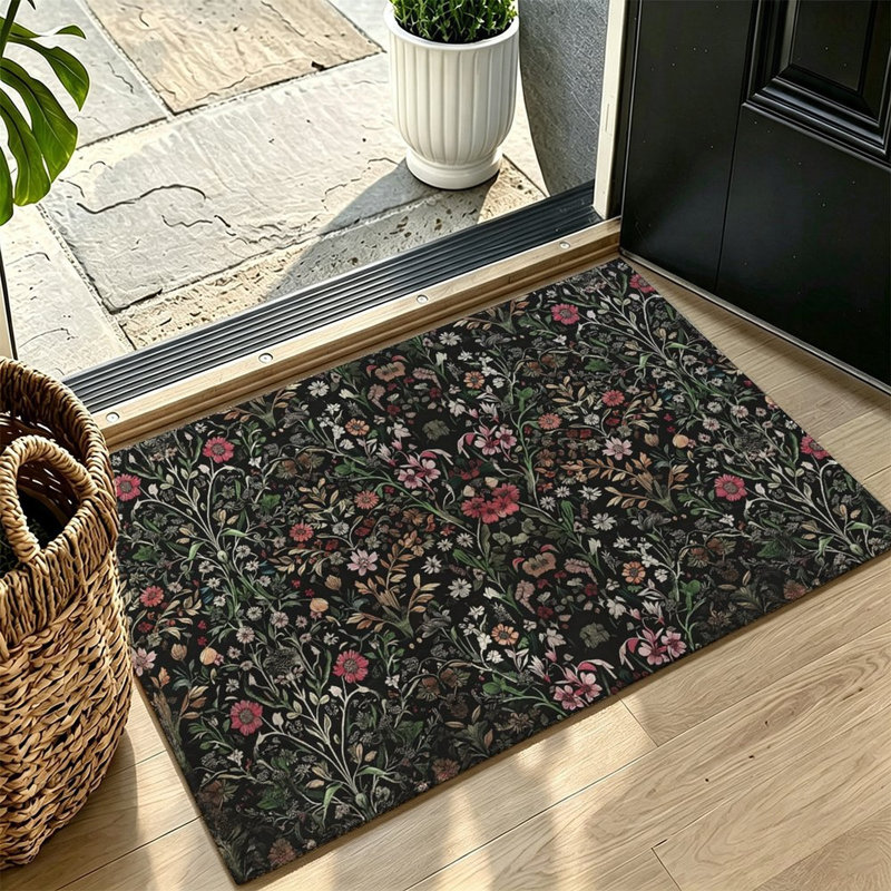 Tapis à motif floral discret sur fond sombre, 119 x 79 cm