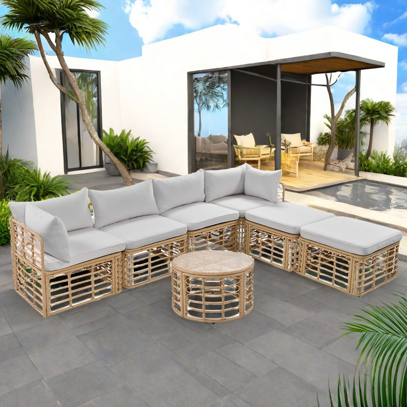 Ensemble de canapé modulaire en rotin pour l'extérieur 7 pièces avec six sièges individuels et une table basse ronde et des oreillers