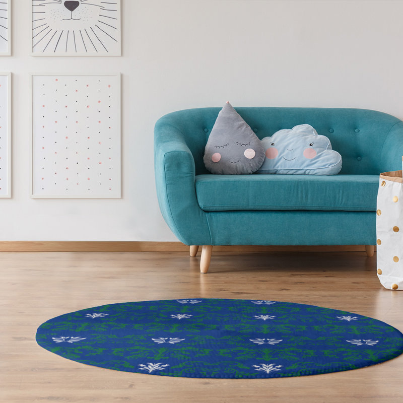 Tapis rond bleu damassé à motif baroque