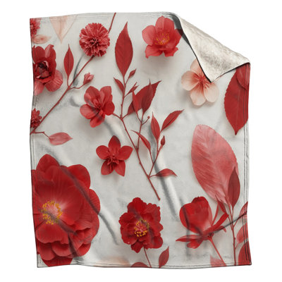 Couvertures d'arrangement floral rouges
