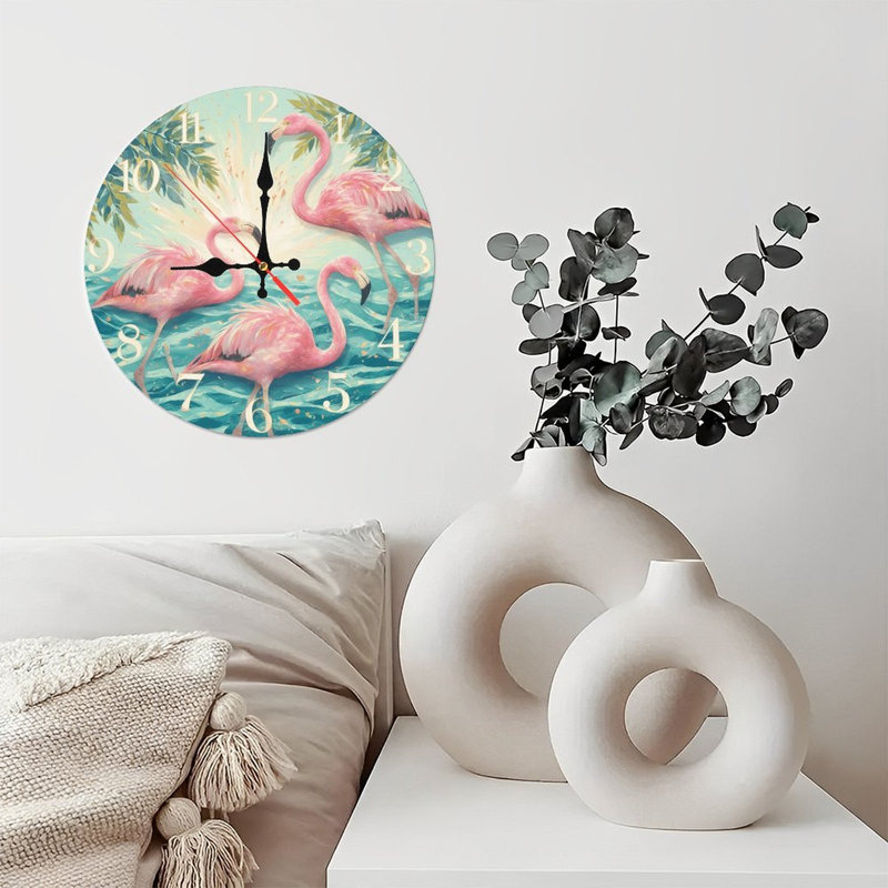 Horloge avec flamants roses dans l'eau