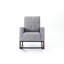 Chaise berçante à dossier en acier gris pour une chaise confortable, gris, atmosphère de maison relaxante