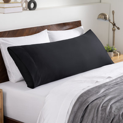 Fermeture de l'enveloppe du coussin en microfibre