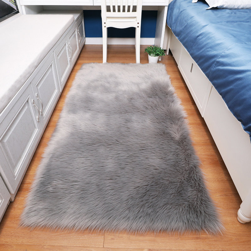 Hirsch Solid Colour Faux Sheepskin Standard Area Rug, Rectangle 100 x 180cm