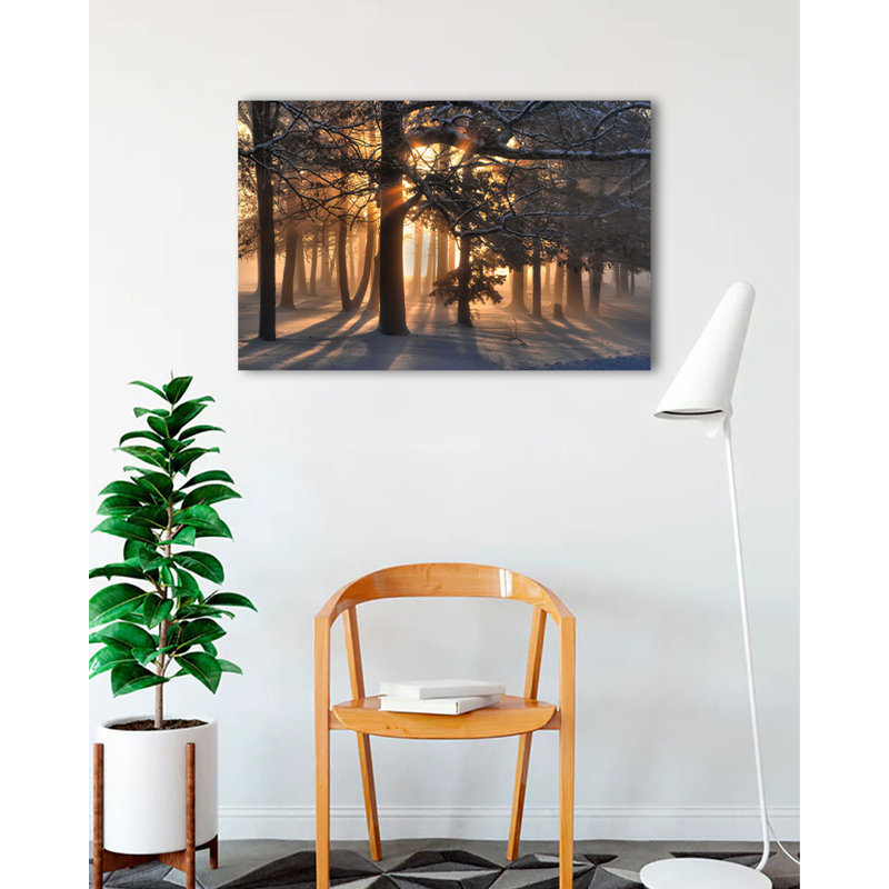 Lever de soleil dans une forêt enneigée sur toile