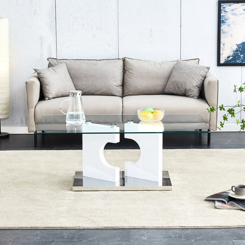 Élégante table basse de salon avec plateau en verre trempé et cadre blanc