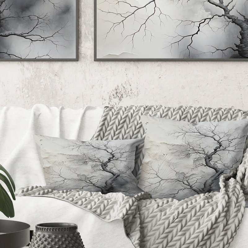 Coussin blanc et gris
