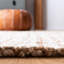 Tapis d'intérieur en jute tissé à la main Crick-915435886