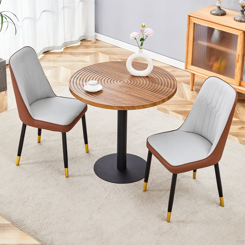 Ensemble de table et de chaises Table de salle à manger ronde de grain de bois foncé de 31,5 pouces - Texture annulaire moulée par aspiration. Combinée avec des chaises de salle à manger en polyuréthane.