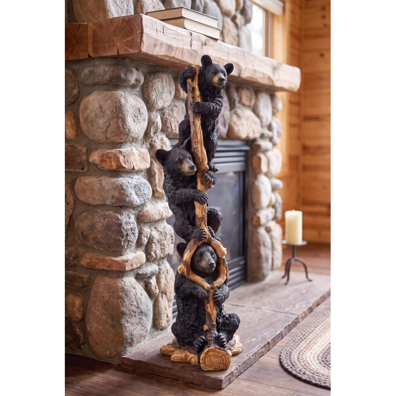 Statue oursons noirs jusqu'à un arbre