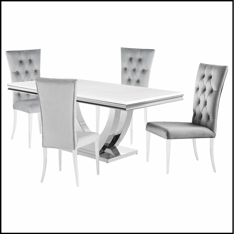 Ensemble de salle à manger rectangulaire moderne avec des sièges confortables pour quatre personnes, conçu pour des repas et des réunions de tous les jours élégants et fonctionnels.