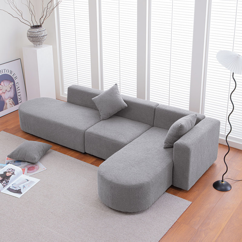 Canapé moderne en forme de L sans os avec siège incurvé, Boucle gris