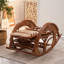 Chaise berçante confortable en rotin