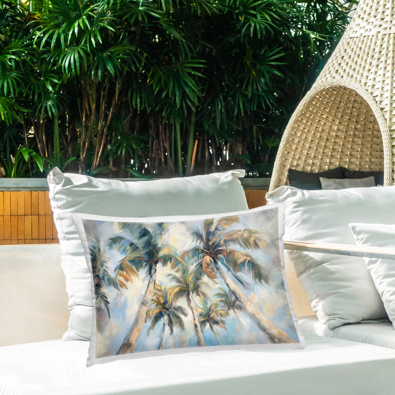Swaying Palms with Soft Clouds Outdoor Printed Pillow design by Ramona Murdock