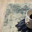 Tapis intérieur beige / bleu sarcelle à motif abstrait Matsumura-395776180