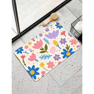 Tapis de bain Doodles à motif floral coloré, l 36 x L 24