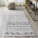 Tapis gris clair / crème